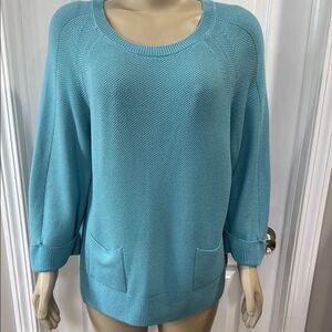 Rabe knit Sweater. The color is called Peacock.
